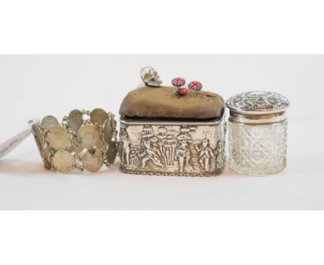 An Edwardian silver sewing box, with embossed decoration and replacement pincushion lid, Chester 1905, 7 cm wide, a silver to