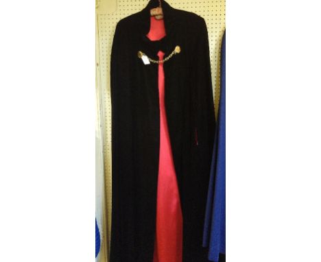 A cloak, with Duke Of Cornwall's Light Infantry buttons, 118 cm long, and two others (3)