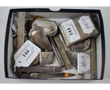 A silver sovereign case, monogrammed, Birmingham 1909, a silver pencil, a silver Whisky decanter label and other items