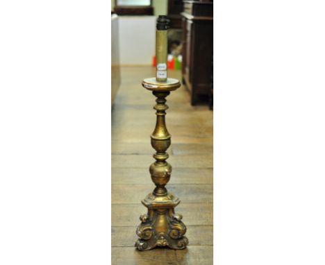 A carved giltwood cricket type lamp, 78 cm high (over fitment)