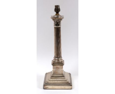 A silver table lamp base, in the form of a Corinthian column, Sheffield 1912, 39.5 cm high (excluding fitment)  See illustrat