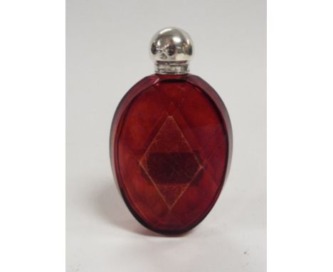 A silver top ruby flashed glass scent bottle, 10.5 cm high