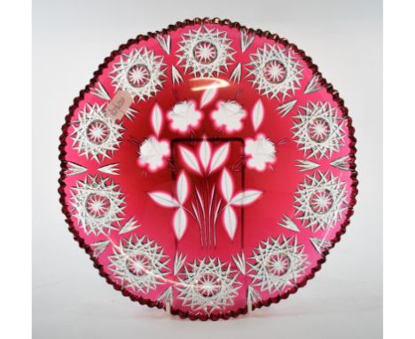 A Bohemian style ruby and clear glass plate, decorated flowers, 29 cm wide, a Carter, Stabler and Adams Poole pottery preserv