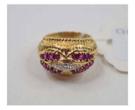 An 18ct gold, ruby and diamond dress ring, approx. ring size O