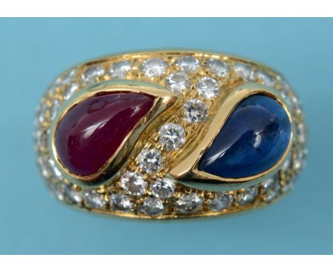 An 18ct gold, cabochon sapphire and ruby ring, set diamonds, approx. ring size L  See illustration Condition report Report by