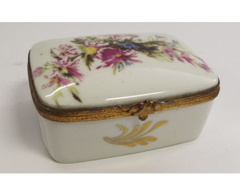 A Halcyon Days enamel oval shaped box and cover, with floral decoration, 5.5 cm wide, and other assorted similar boxes (12)
