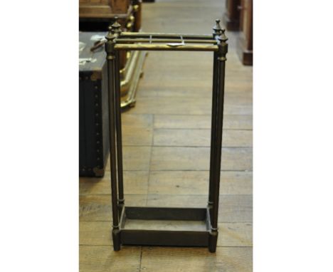 A brass six division stick stand, 65.5 cm high