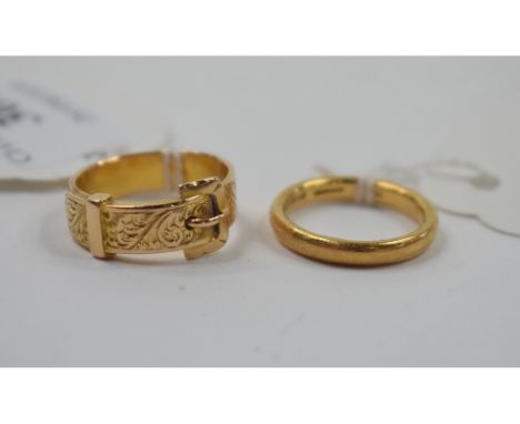 A 22ct gold wedding band, approx. ring size M, approx. 4.9 g, and an 18ct gold buckle ring, approx. ring size P, approx. 6.3 