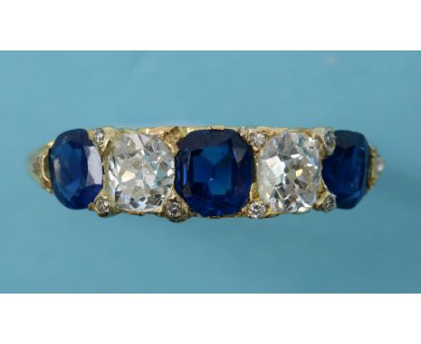 An 18ct gold, sapphire and diamond ring, approx. ring size M½  See inside front cover colour illustration