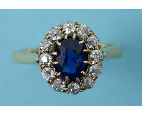 An 18ct gold, sapphire and diamond cluster ring, approx. ring size K½  See inside back cover colour illustration Condition re