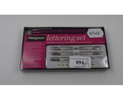 A Parker Rialto fountain pen and roller ball set, cased, a lettering set, and a decimalisation ball point by the same (3) 