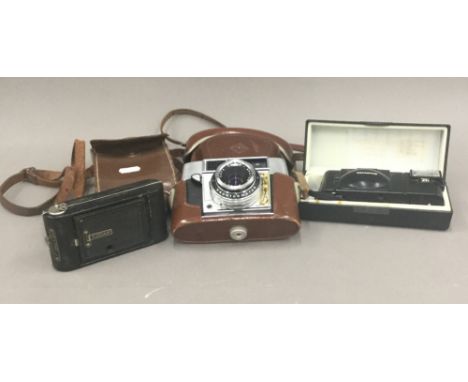 Three vintage cameras