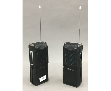 A pair of vintage walkie talkies