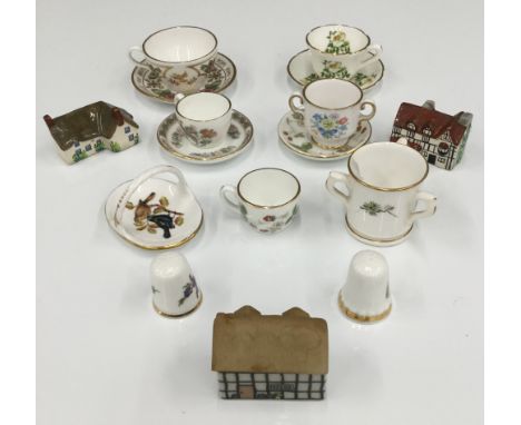 A small quantity of miniature porcelain items, including a Royal Worcester tyg