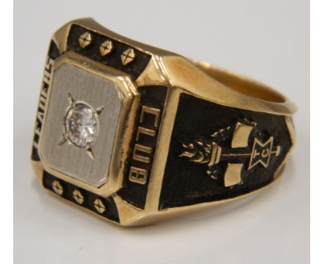 An American 10 K gold and diamond Leaders Club ring (18.2 grammes total weight)