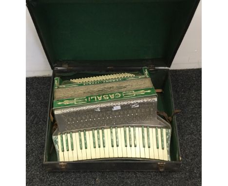 A cased Casali accordion