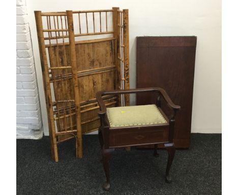 A Victorian piano stool, a folding bagatelle board and a bamboo shelf