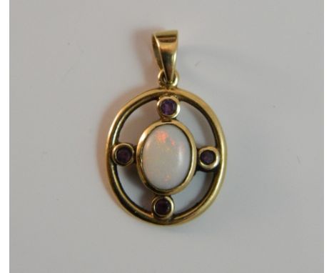 A 9 ct gold opal and ruby pendant (2.3 grammes total weight)