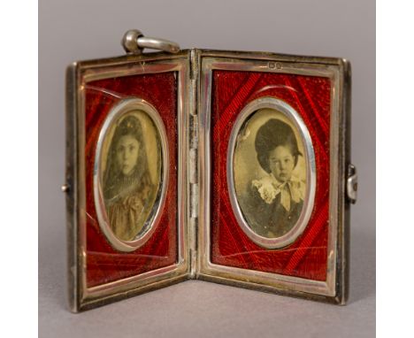 A Victorian silver travelling photograph locket, hallmarked Chester 1895, maker's mark of MTB, of hinged rectangular form wit