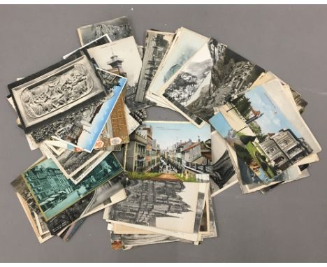 A box of foreign vintage postcards