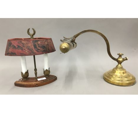 A brass desk lamp, together with another lamp