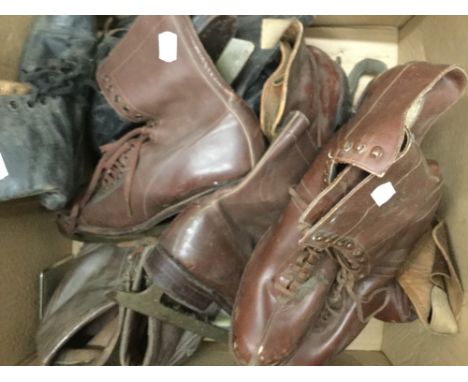 A quantity of vintage leather ice skates
