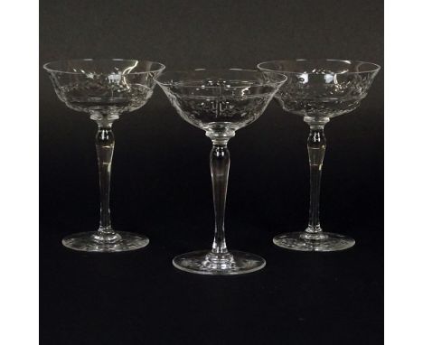Three Vintage Etched Crystal Champagne Coupes. Unsigned. Good condition. Measures 6-1/4". Shipping $38.00 (estimate $25-$50)
