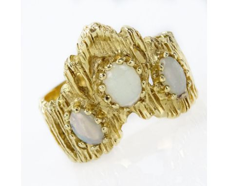 Vintage 14 Karat Yellow Gold and Three (3) Opal Ring. Unsigned. Good condition. Ring size 9. Approx. weight: 7.8 grams. Shipp