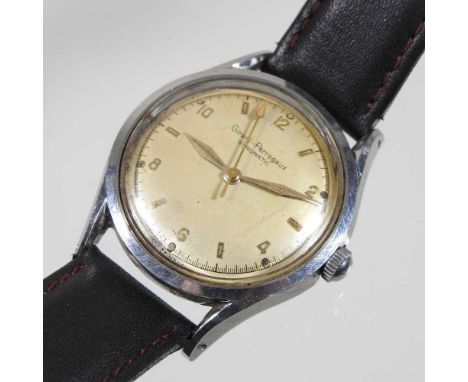 A mid 20th century Girard-Perregaux steel cased vintage gentleman's wristwatch, having a signed dial, on a brown leather stra