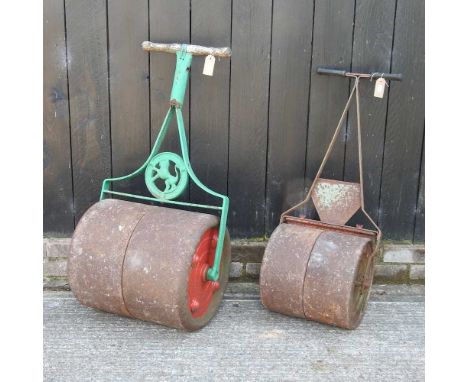 A green painted garden roller, together with a smaller roller (2)largest 50w x 42d x 103h cm