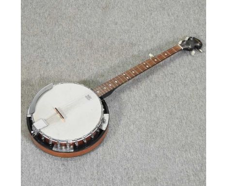 A Stagg banjo, cased94cm long