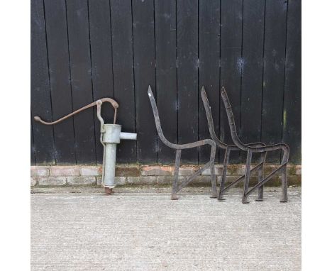A garden water pump, together with a pair of garden bench endsPump 74h cm