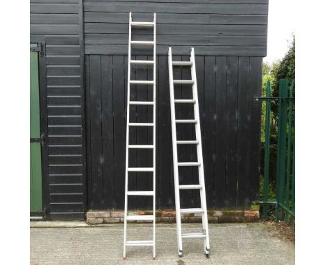 An aluminium ladder, together with another smaller (2)Larger 598cm overallSmaller 502cm overall