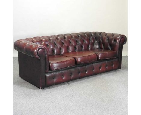 A red upholstered button back chesterfield sofa190w x 82d x 66h cm