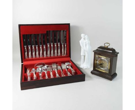 A Royal Doulton Images figure, together with a mid 20th century canteen of Sheffield plated cutlery and an Elliott mantel clo