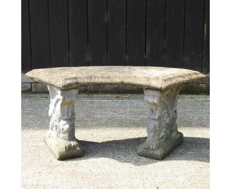 A reconstituted stone curved garden bench104w x 37d x 47h cm