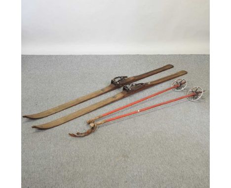 A pair of vintage wooden skis and poles193cm long