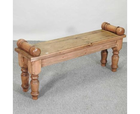A rustic pine hand made bench, on turned legs122w x 31d x 55h cm