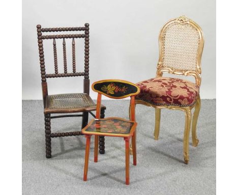 A 19th century bobbin turned chair, together with a gold upholstered armchair and a painted child's chair (3)
