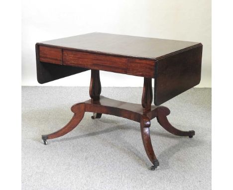 A Regency mahogany sofa table, containing a single frieze drawer, on a quadruped base145w x 70d x 70h cm overall