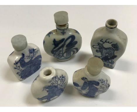 A Chinese blue and white flattened baluster shaped snuff bottle each side decorated with Kylin, one with six character mark 7