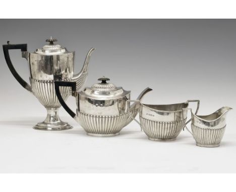 Edward VII silver four piece tea service comprising: teapot, coffee pot, two handled sugar basin and cream jug, all with half