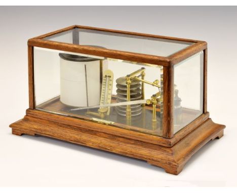 Early 20th Century oak-cased barograph, Chas. Hymans, Cambridge, having an eight-tier vacuum with lacquered brass furniture, 