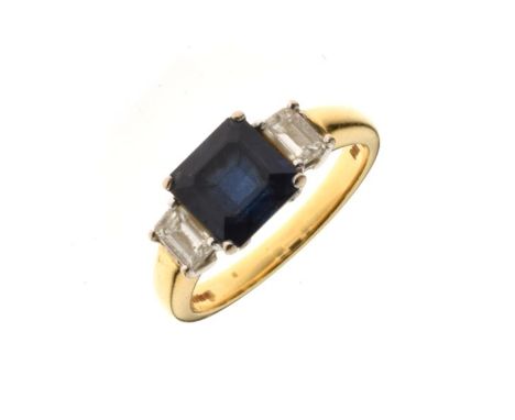 Sapphire and diamond three stone 18ct gold ring, the square cut sapphire measuring approximately 7mm x 7mm x 4.1mm deep, flan