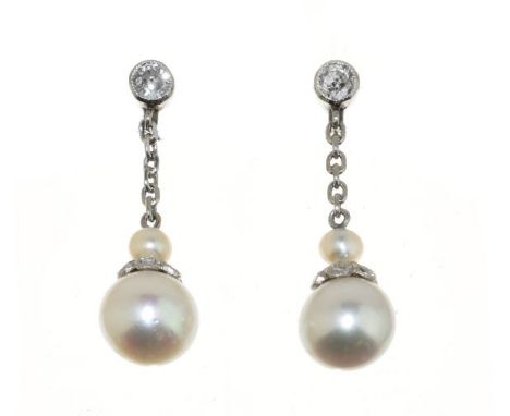 Pair of diamond and cultured pearl drop earrings, the white mounts unmarked, the fitting set with an old Swiss cut diamond, c