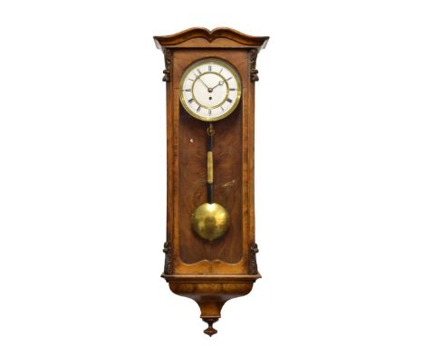 Late 19th Century figured walnut-cased weight-driven Vienna-style wall clock, the white Roman dial with moon hands, with sing