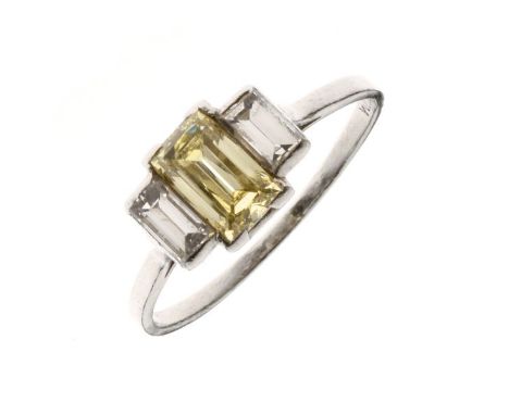 Light fancy yellow diamond ring, stamped 'Platinum', the rectangular scissor cut light fancy yellow diamond measuring approxi