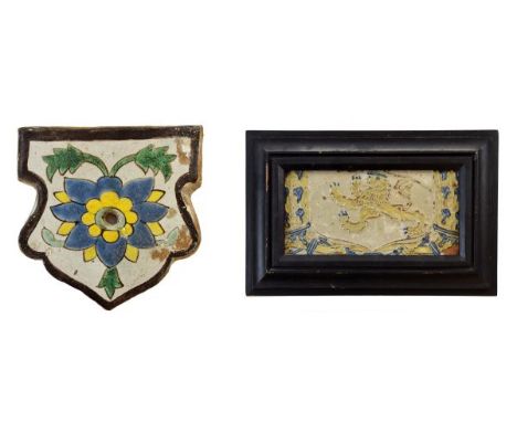 Spanish pottery tile decorated in the Cuenca technique with an armorial lion, identical to the lower tile of a three section 