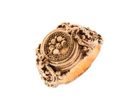 14ct yellow gold ring, probably Indian or Middle Eastern having decorative circular central panel within conforming decorated