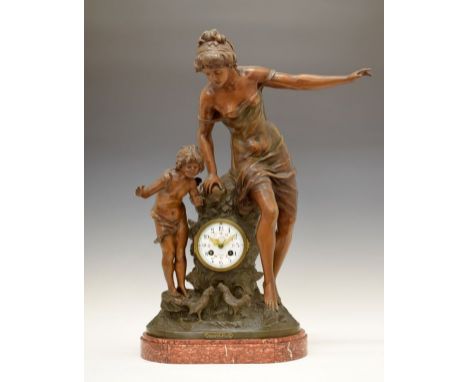 Early 20th Century French bronzed spelter figural mantel clock, A.D. Mougin, Paris, retailed by Olivier, Castres, the 9.5cm w